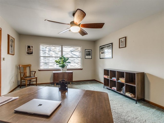 home office with carpet flooring and ceiling fan