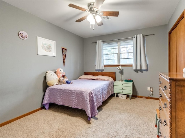 bedroom with ceiling fan and carpet