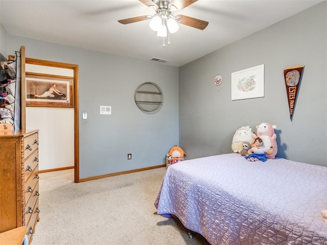 bedroom with light carpet and ceiling fan