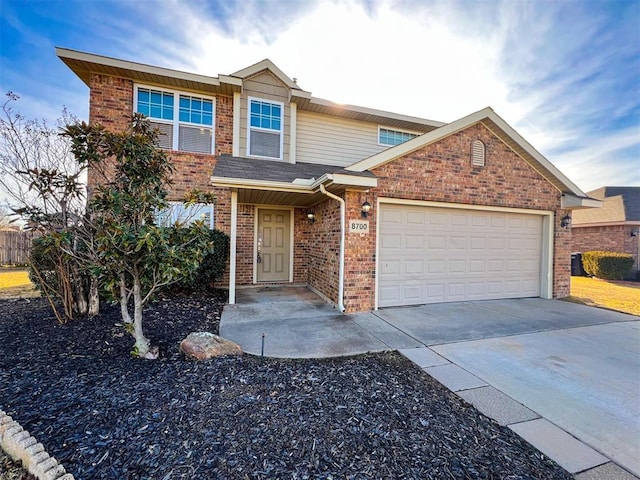 view of front of property featuring a garage