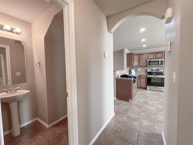 hallway featuring sink