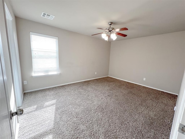 carpeted empty room with ceiling fan