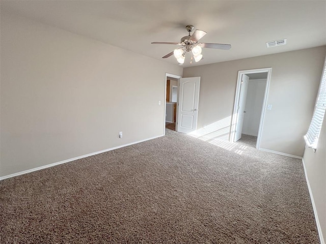 interior space with ceiling fan