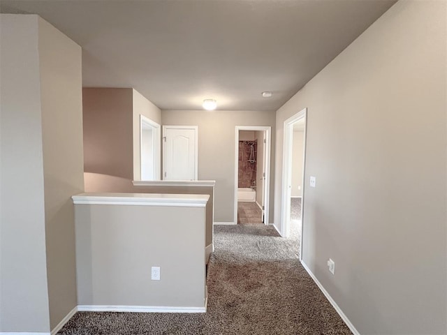 corridor with carpet floors