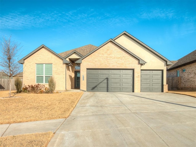 ranch-style house featuring a garage