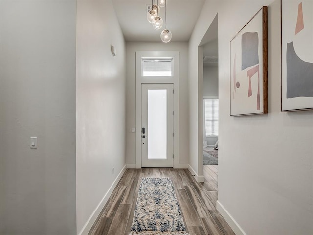 doorway to outside featuring hardwood / wood-style flooring