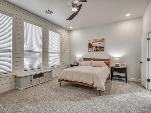 carpeted bedroom with ceiling fan