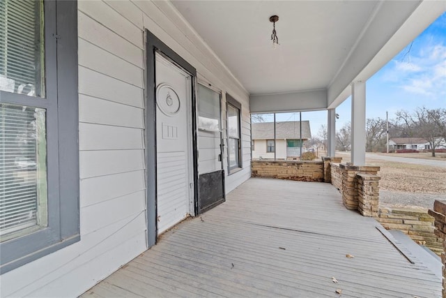 deck featuring covered porch