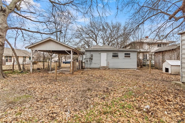 exterior space with a carport