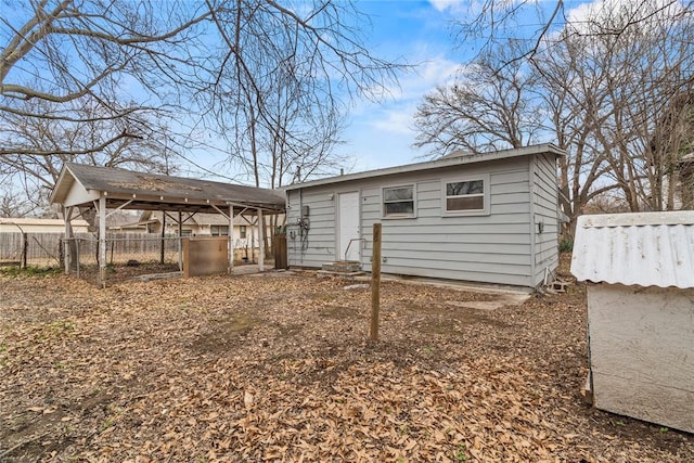 exterior space featuring an outbuilding