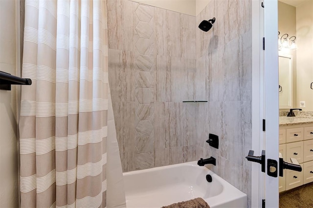 bathroom featuring vanity and shower / bath combo