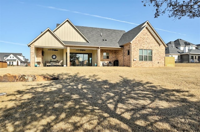 view of front of home featuring a patio and ceiling fan