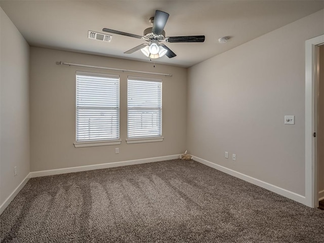 empty room with carpet flooring and ceiling fan