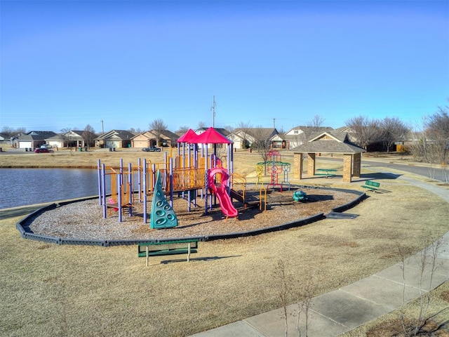 view of play area with a water view