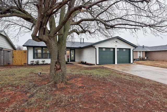 ranch-style home with a garage