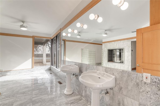 bathroom featuring marble finish floor, visible vents, and a ceiling fan