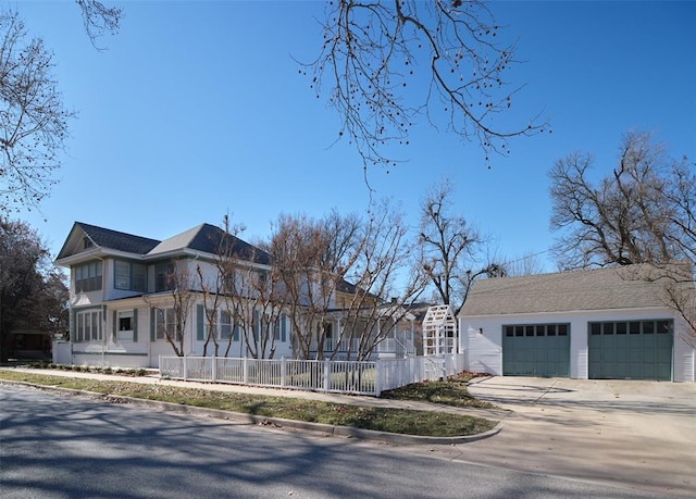 view of side of home with a garage