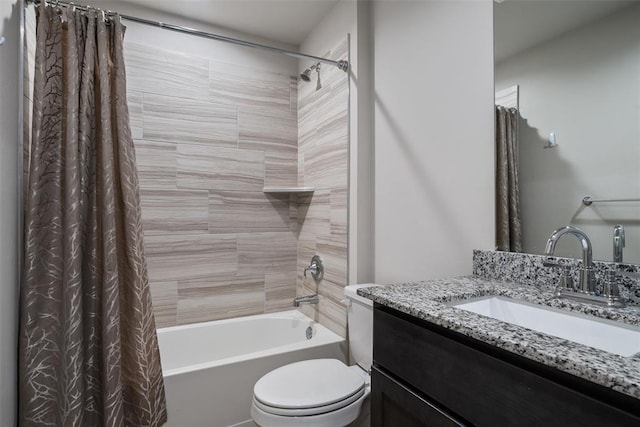 full bathroom with shower / tub combo with curtain, vanity, and toilet