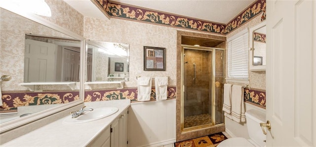 bathroom with vanity and an enclosed shower