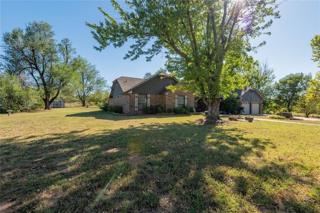 exterior space with a garage and a front yard