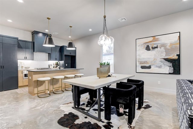 dining area featuring sink