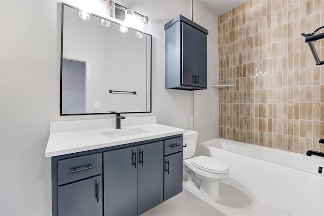 full bathroom with vanity, toilet, and tiled shower / bath