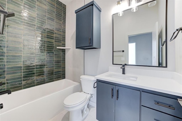 full bathroom featuring vanity, toilet, and tiled shower / bath combo