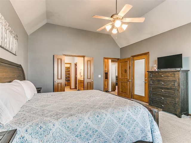 carpeted bedroom featuring lofted ceiling and ceiling fan