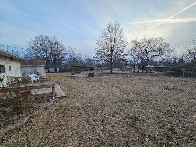 view of yard featuring a wooden deck