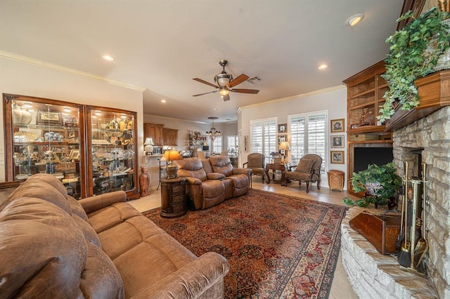 living room with ceiling fan, ornamental molding, a stone fireplace, and light tile patterned floors