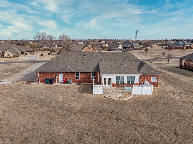 back of property with a patio and central air condition unit