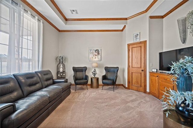 carpeted living room with crown molding