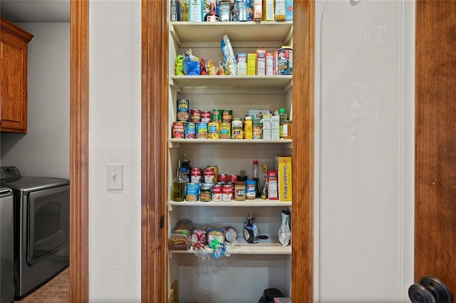 pantry featuring separate washer and dryer