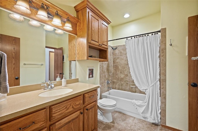 full bathroom featuring shower / bath combination with curtain, tile patterned floors, vanity, and toilet