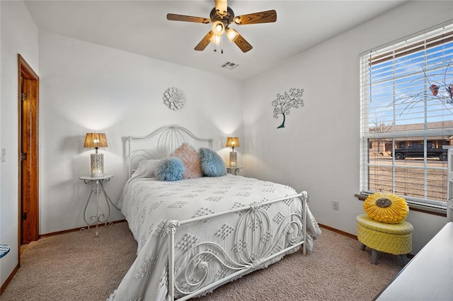 bedroom featuring ceiling fan and carpet flooring