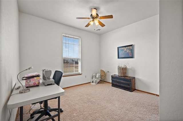 office area featuring carpet flooring and ceiling fan