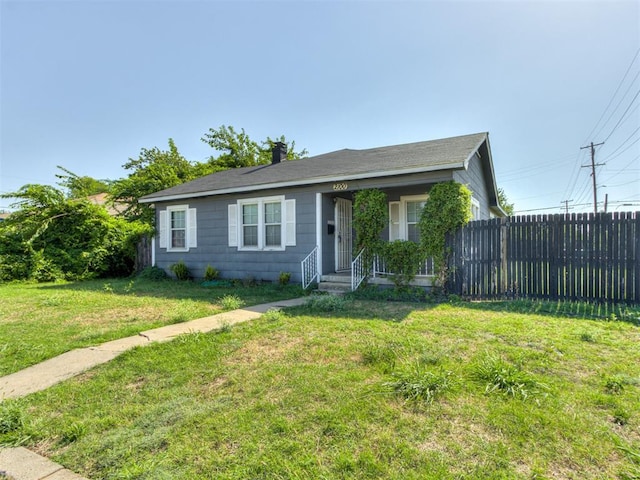 view of front of home with a front yard