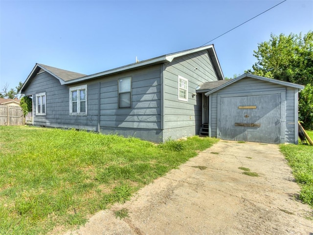 rear view of house with a lawn