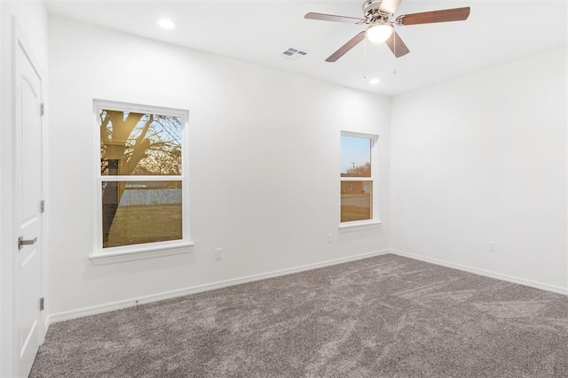 unfurnished room featuring carpet flooring and ceiling fan