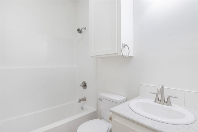 full bathroom with vanity, shower / washtub combination, and toilet