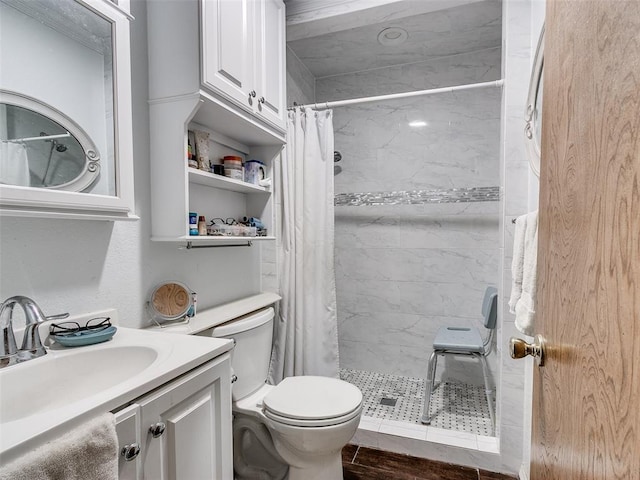 bathroom with hardwood / wood-style flooring, vanity, toilet, and a shower with shower curtain