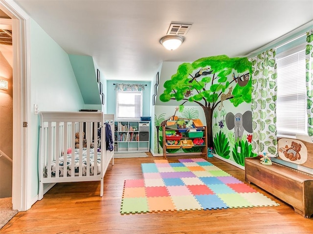 bedroom featuring hardwood / wood-style flooring