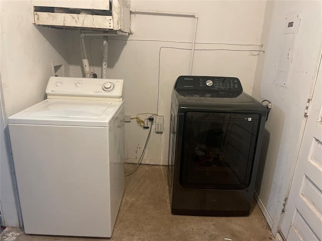 washroom featuring washer and clothes dryer