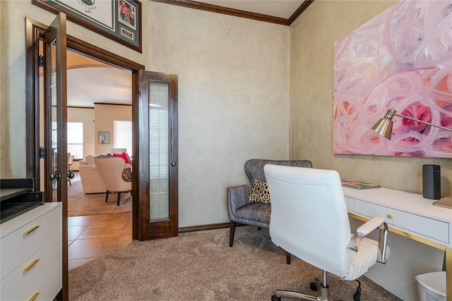 office with crown molding and light colored carpet