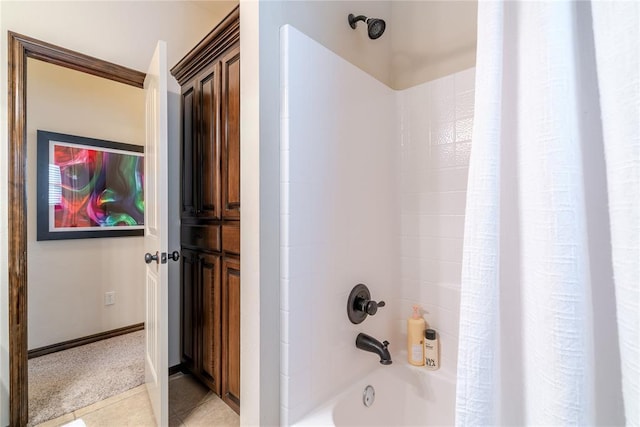 bathroom featuring tile patterned flooring and shower / bath combination with curtain