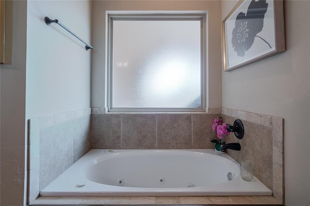 bathroom featuring tiled bath