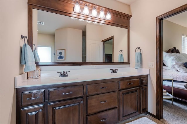 bathroom featuring vanity and plenty of natural light