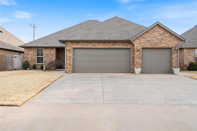 single story home with a garage