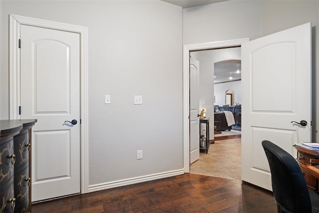 home office featuring dark hardwood / wood-style floors