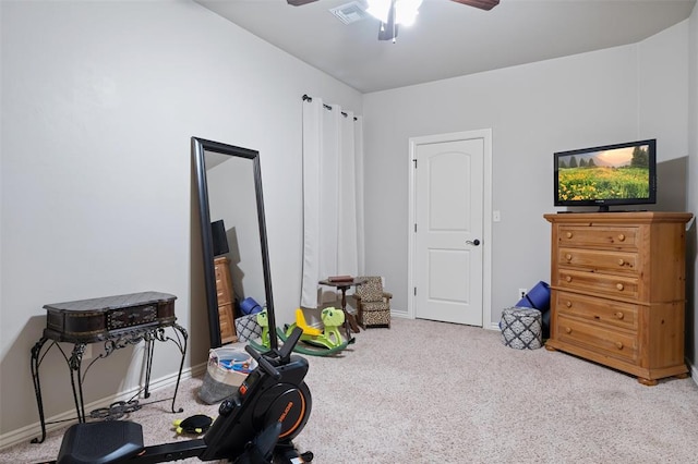 misc room with ceiling fan and carpet